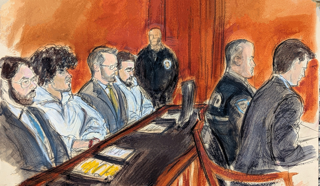 FILE - From left, defense attorney Mehdi Essmidi, defendant Emir Balat, defense attorney Michael Arthus and defendant Ibrahim Kayumi wait for the start of arraignment proceedings in Manhattan federal court in New York, March, 9, 2026, on charges that include attempting to provide material support to a terrorist organization and using a weapon of mass destruction in New York after Balat and Kayumi were arrested for bringing and throwing explosives at a protest two days earlier. (Elizabeth Williams via AP, File)