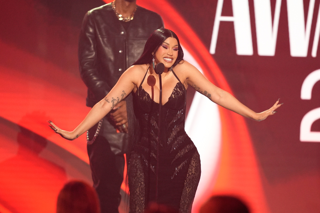 Cardi B accepts the award for best female hip hop artist during the BET Awards on Sunday, June 28, 2026, at the Peacock Theater in Los Angeles. (AP Photo/John Locher)