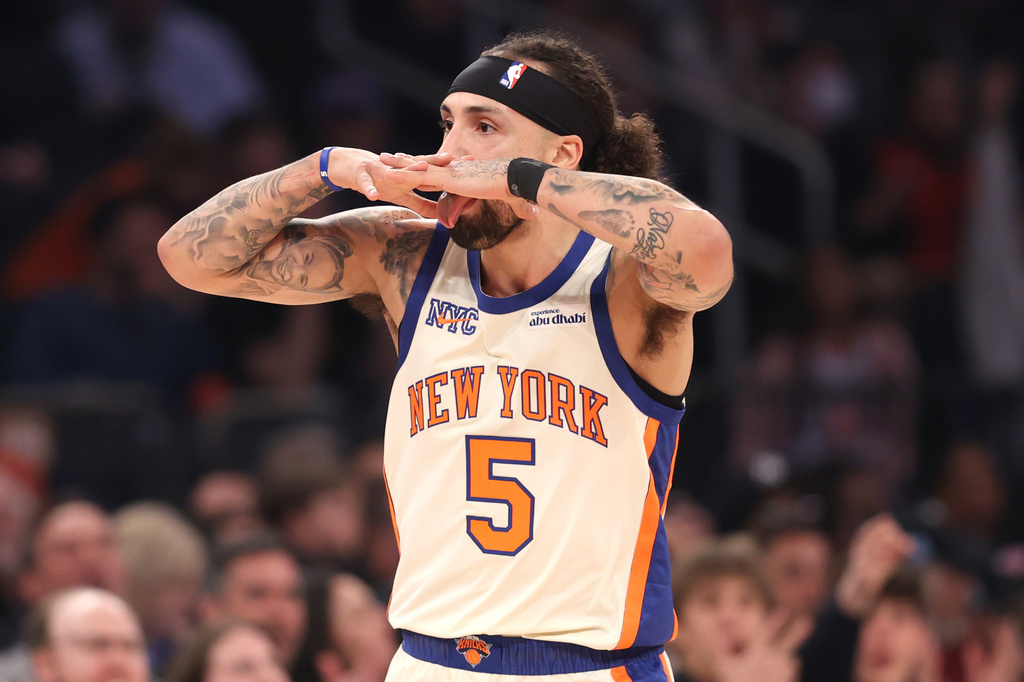 New York Knicks' Jose Alvarado (5) reacts after scoring a three-point basket during the first half of an NBA basketball game against the Charlotte Hornets, Sunday, April 12, 2026, in New York. (AP Photo/Pamela Smith)