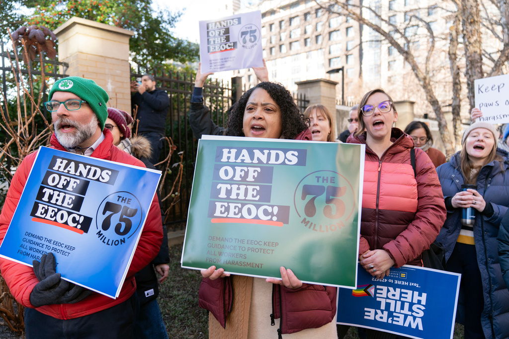 Members of the 75 Million coalition rally outside of the Equal Employment Opportunity Commission (EEOC) agency's headquarters Thursday, Jan. 22, 2026, in Washington, opposing the Equal Employment Opportunity Commission's move to rescind its 2024 Enforcement Guidance on Harassment in the Workplace. (AP Photo/Jose Luis Magana)