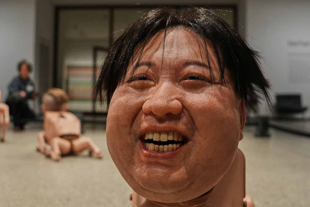 A Robot in the likeness of Kim Jong Un displayed at the installation titled Regular Animals by artist Beeple, Mike Winkelmann, at the Neue Nationalgalerie museum in Berlin, Germany, Tuesday, April 28, 2026. (AP Photo/Markus Schreiber)