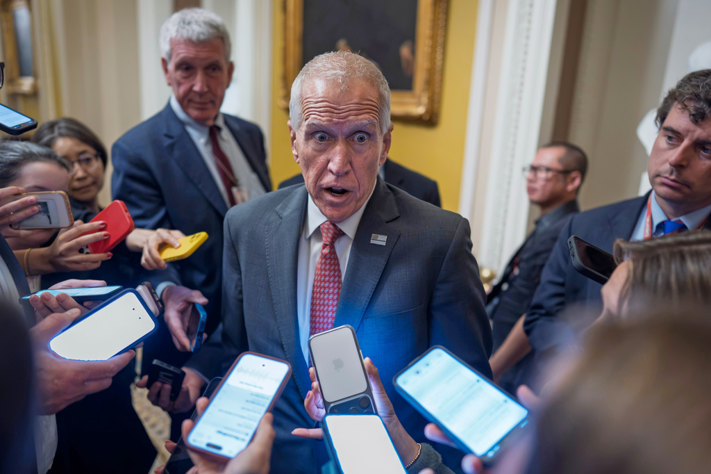 Sen. Thom Tillis, R-N.C., speaks to reporters as Republican senators arrive for a closed-door lunch at the Capitol in Washington, Tuesday, June 23, 2026, to prepare for a meeting with President Donald Trump Wednesday. (AP Photo/J. Scott Applewhite)
