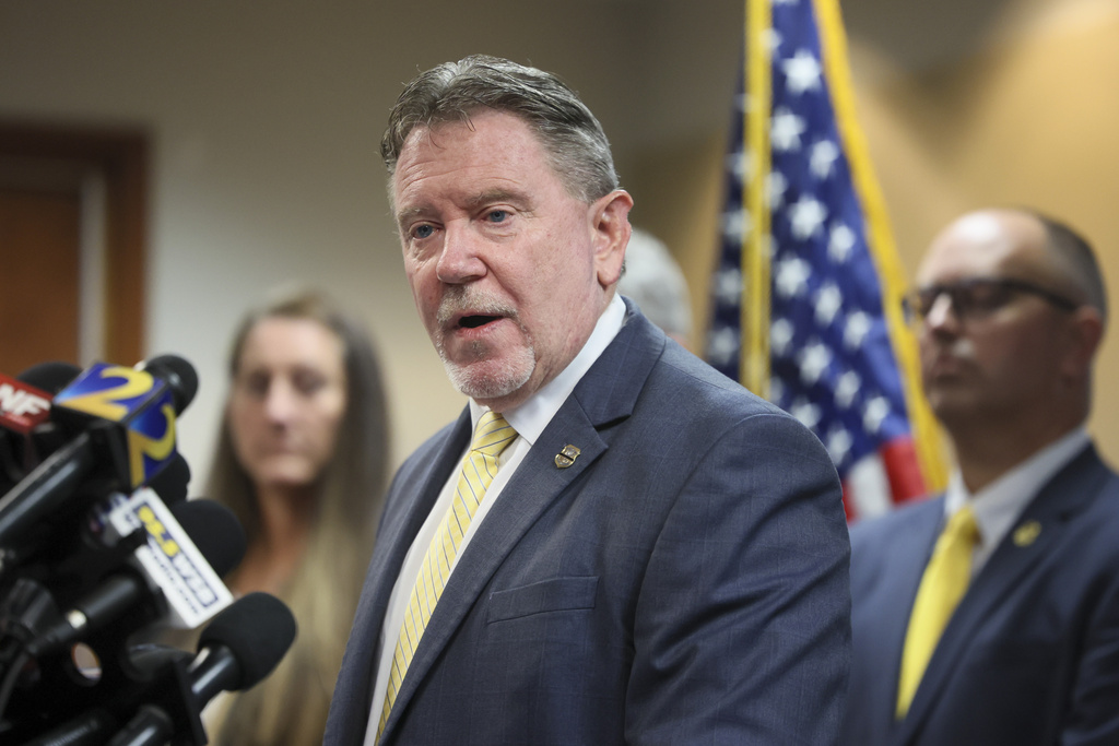 Chris Hosey, Director of Georgia Bureau of Investigation, speaks about the details of the shooting near the CDC and Emory University at the GBI headquarters, Tuesday, Aug., 12, 2025, in Decatur, Ga. (Jason Getz/Atlanta Journal-Constitution via AP)