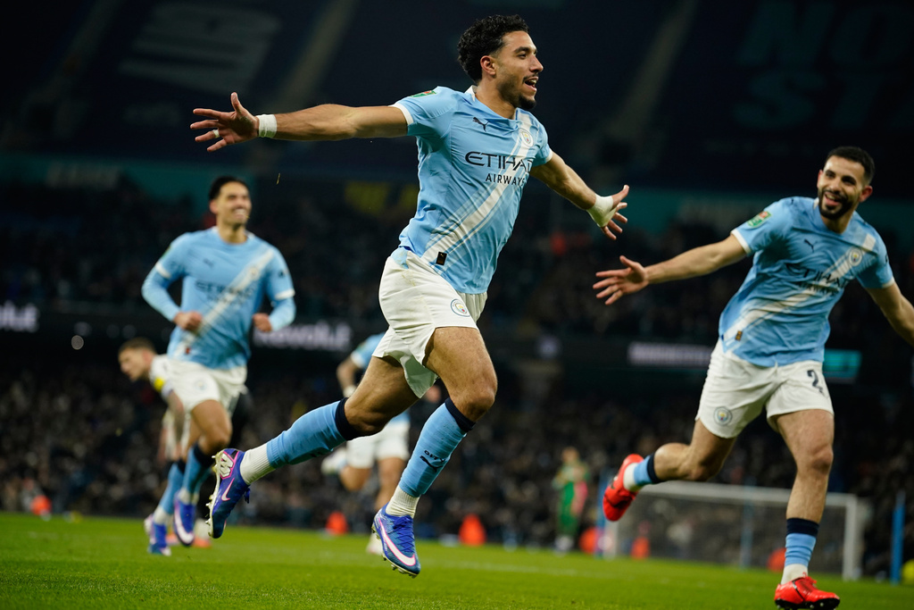 Manchester City's Omar Marmoush celebrates after scoring during the English League Cup semifinal soccer match soccer match between Manchester City and Newcastle in Manchester, England, Wednesday, Feb. 4, 2026. (AP Photo/Dave Thompson)