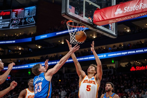 Atlanta Hawks guard Dyson Daniels (5), right, attempts to gain possession of the ball against Oklahoma City Thunder guard Brooks Barnhizer (23) during the first half of an NBA basketball game, Saturday, Oct. 25, 2025, in Atlanta. (AP Photo/Erik Rank) Atlanta Hawks guard Dyson Daniels (5), right, attempts to gain possession of the ball against Oklahoma City Thunder guard Brooks Barnhizer (23) during the first half of an NBA basketball game, Saturday, Oct. 25, 2025, in Atlanta. (AP Photo/Erik Rank)