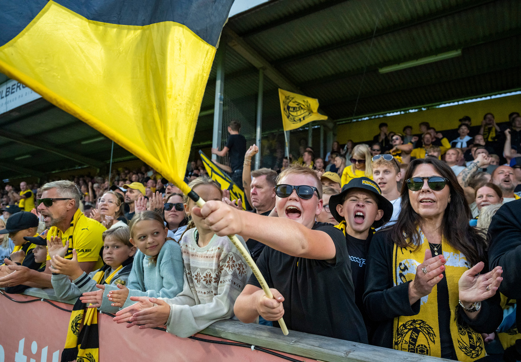 Mjallby supporters at the stand during the soccer match between Mjallby AIF and Halmstad BK at Strandvallen in Hallevik, Sweden, Saturday Aug. 30, 2025. (Johan Nilsson /TT News Agency via AP)