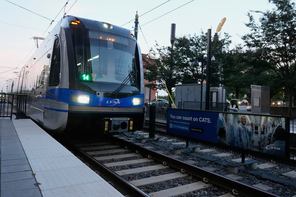 FILE - A Charlotte Area Transit System light rail arrives at a station, Monday, Sept. 8, 2025, in Charlotte, N.C. (AP Photo/Erik Verduzco, File)