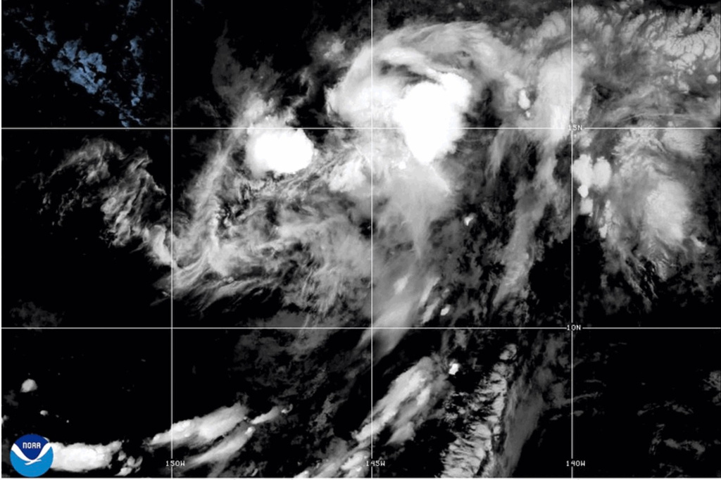 This NOAA satellite image taken at 11:04 a.m. EST on Thursday, Aug. 13, 2026, shows Tropical Storm Lala in the Pacific Ocean. (NOAA via AP)