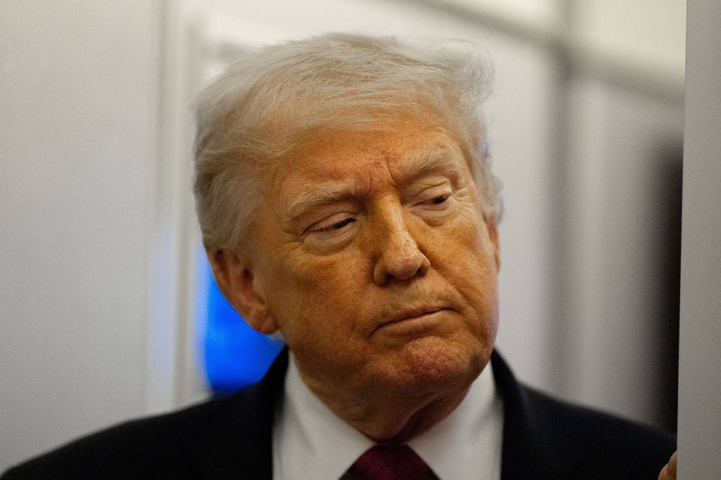 President Donald Trump speaks with reporters while in flight aboard Air Force One, Friday, April 17, 2026, while in route to Joint Base Andrews, Md. (AP Photo/Alex Brandon)