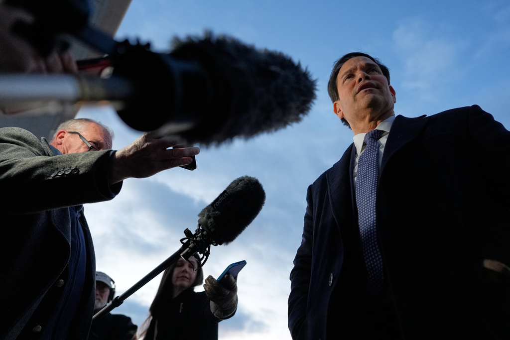 Secretary of State Marco Rubio speaks to reporters before boarding his plane, Thursday, Feb. 12, 2026, at Joint Base Andrews, Md., en route to the Munich Security Conference. (AP Photo/Alex Brandon, Pool)