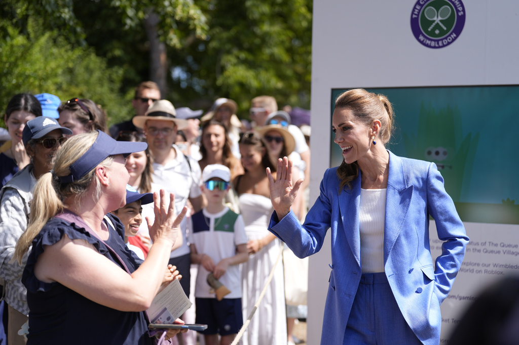 Britain's Kate, the Princess of Wales gestures during a visit on day four of the Wimbledon Tennis Championships in London, Thursday, July 2, 2026. (AP Photo/Andrew Matthews)