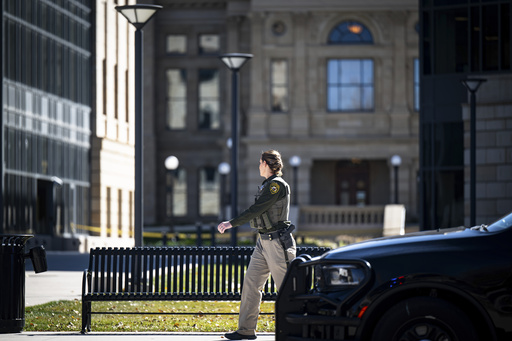 A state trooper sweeps the grounds of the Wyoming Capitol after a suspected improvised explosive device (IED) was found at the state Capitol on Tuesday, Oct. 21, 2025, in Cheyenne, Wyo. (Milo Gladstein/The Wyoming Tribune Eagle via AP) A state trooper sweeps the grounds of the Wyoming Capitol after a suspected improvised explosive device (IED) was found at the state Capitol on Tuesday, Oct. 21, 2025, in Cheyenne, Wyo. (Milo Gladstein/The Wyoming Tribune Eagle via AP)