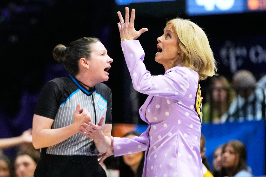 LSU head coach Kim Mulkey challenges an official during the second half in the first round of the NCAA college basketball tournament against Jacksonville, Friday, March 20, 2026, in Baton Rouge, La. (AP Photo/Gerald Herbert)