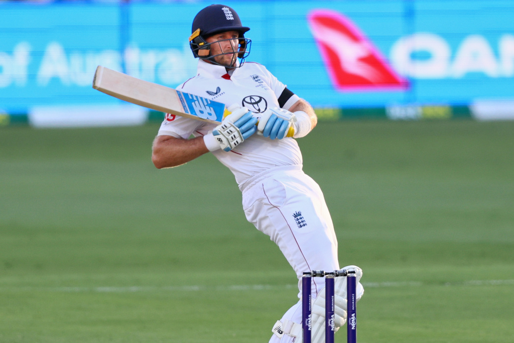 England's Joe Root plays a shot during the second Ashes cricket test match between Australia and England in Brisbane, Thursday, Dec. 4, 2025.. (AP Photo/Tertius Pickard)