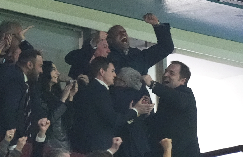 Britain's Prince William, Prince of Wales, rear center, celebrates Aston Villa's third goal during the Europa League soccer match between Aston Villa and Nottingham Forest, Thursday May 7, 2026, Birmingham, England. (Mike Egerton/PA via AP)