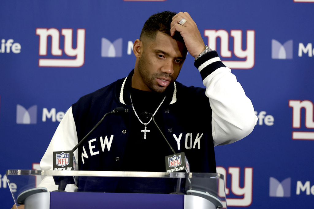 New York Giants quarterback Russell Wilson speaks during a news conference following an NFL football game early Monday, Sept. 22, 2025, in East Rutherford, N.J. (AP Photo/Adam Hunger)