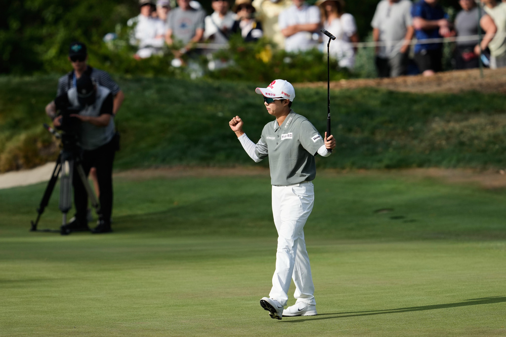 Hyo Joo Kim, of South Korea, reacts after making a birdie putt on the 14th green during the final round of the LPGA Fortinet Founders Cup golf tournament, Sunday, March 22, 2026, in Menlo Park, Calif. (AP Photo/Godofredo A. Vásquez)