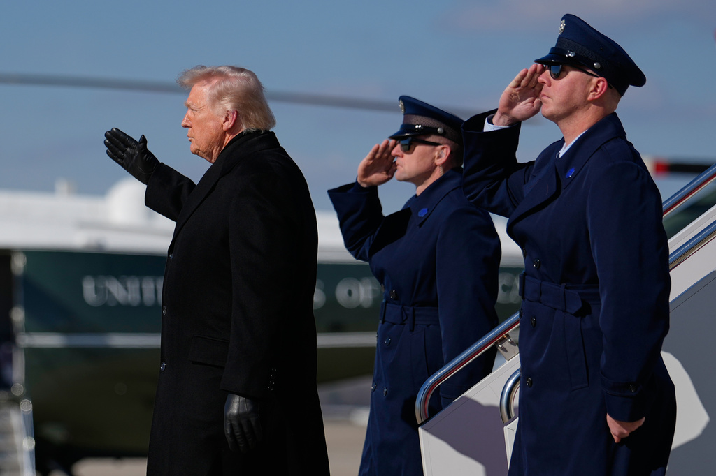 President Donald Trump arrives on Air Force One, Wednesday, March 18, 2026, at Joint Base Andrews, Md., after attending the casualty return at Dover Air Force Base, Del., for the six crew members of an Air Force refueling aircraft who died when their plane crashed in western Iraq while supporting operations against Iran. (AP Photo/Julia Demaree Nikhinson)