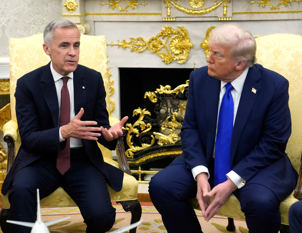 Canada Prime Minister Mark Carney and President Donald Trump hold a press conference at the White House in Washington, Tuesday, Oct. 7, 2025. (Adrian Wyld/The Canadian Press via AP)