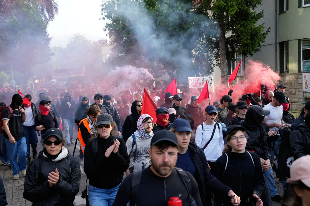 Protesters gather before a party convention of Alternative for Germany, or AfD in Erfurt, Germany, Saturday, July 4, 2026. (AP Photo/Ebrahim Noroozi)