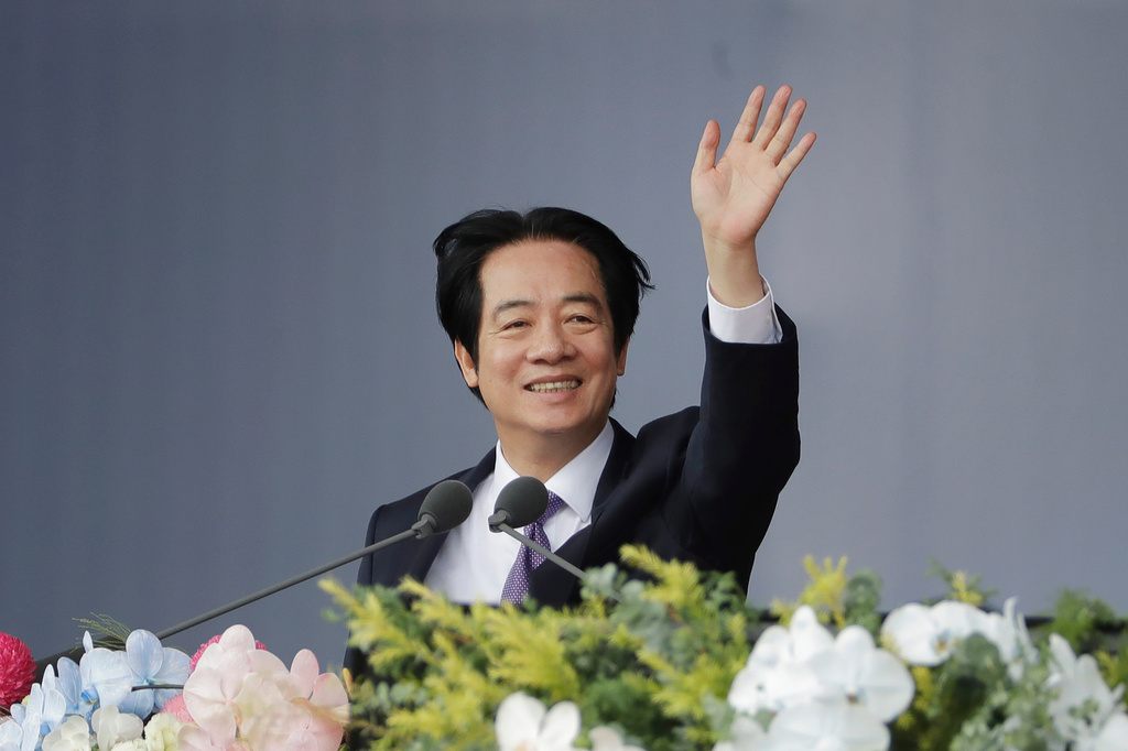 Taiwanese President Lai Ching-te waves during National Day celebrations in Taipei, Taiwan, Saturday, Oct. 10, 2026. (AP Photo/Chiang Ying-ying)