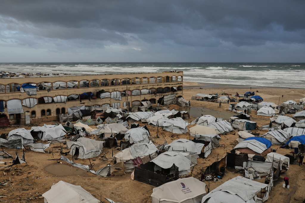 A view of a displacement camp sheltering Palestinians on a beach amid stormy weather in Gaza City, Tuesday, Jan. 13, 2026. (AP Photo/Jehad Alshrafi)