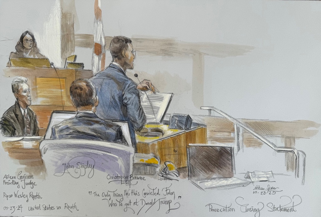 This courtroom sketch shows U.S. District Judge Aileen Cannon listening as prosecutor Christopher speaks during the trial of Ryan Routh, at left, who is charged with attempting to assassinate Donald Trump last year at a golf course in South Florida, Tuesday, Sept. 23, 2025, in Fort Pierce, Fla. (Lothar Speer via AP)