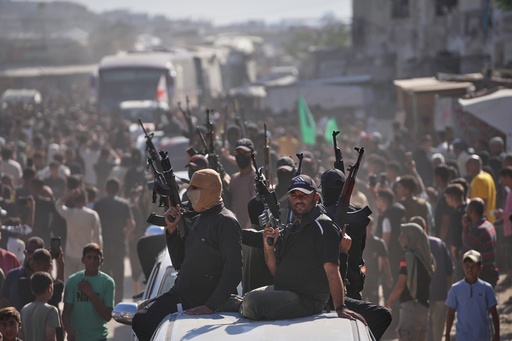 Hamas gunmen on pickup trucks escort buses carrying freed Palestinian prisoners as they are greeted following their release from Israeli jails under a cease-fire agreement between Hamas and Israel, in Khan Younis, southern Gaza Strip, Monday, Oct. 13, 2025. (AP Photo/Jehad Alshrafi) Hamas gunmen on pickup trucks escort buses carrying freed Palestinian prisoners as they are greeted following their release from Israeli jails under a cease-fire agreement between Hamas and Israel, in Khan Younis, southern Gaza Strip, Monday, Oct. 13, 2025. (AP Photo/Jehad Alshrafi)