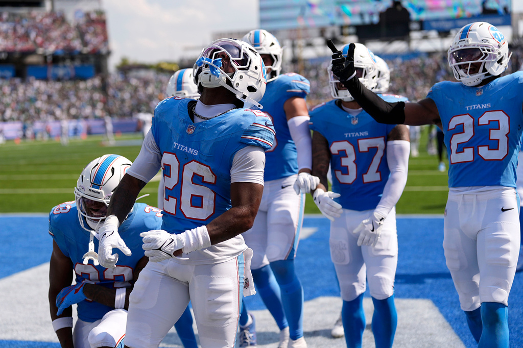 Tennessee Titans cornerback Marcus Harris (26) celebrates with teammates after intercepting a pass during the second half of an NFL football game against the Philadelphia Eagles, Sunday, Sept. 20, 2026, in Nashville, Tenn.(AP Photo/George Walker IV)