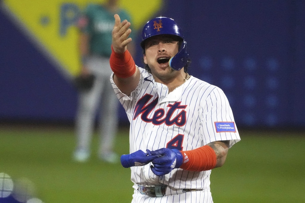New York Mets' Francisco Alvarez celebrates after driving in a run with a double off Seattle Mariners pitcher George Kirby during the second inning of the Little League Classic baseball game at Bowman Field in Williamsport, Pa., Sunday, Aug. 17, 2025. (AP Photo/Gene J. Puskar)