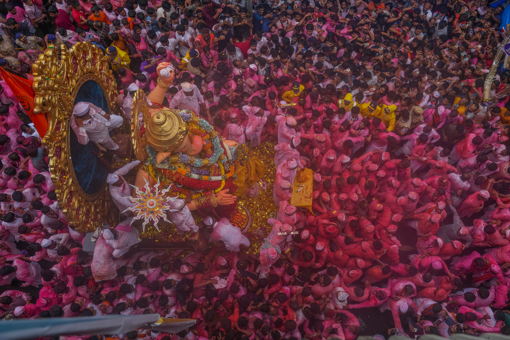 An idol of elephant-headed Hindu god Ganesha is taken for immersion on the final day of the ten-day long Ganesh Chaturthi festival in Mumbai, India, Saturday, Sept. 6, 2025. (AP Photo/Rafiq Maqbool)