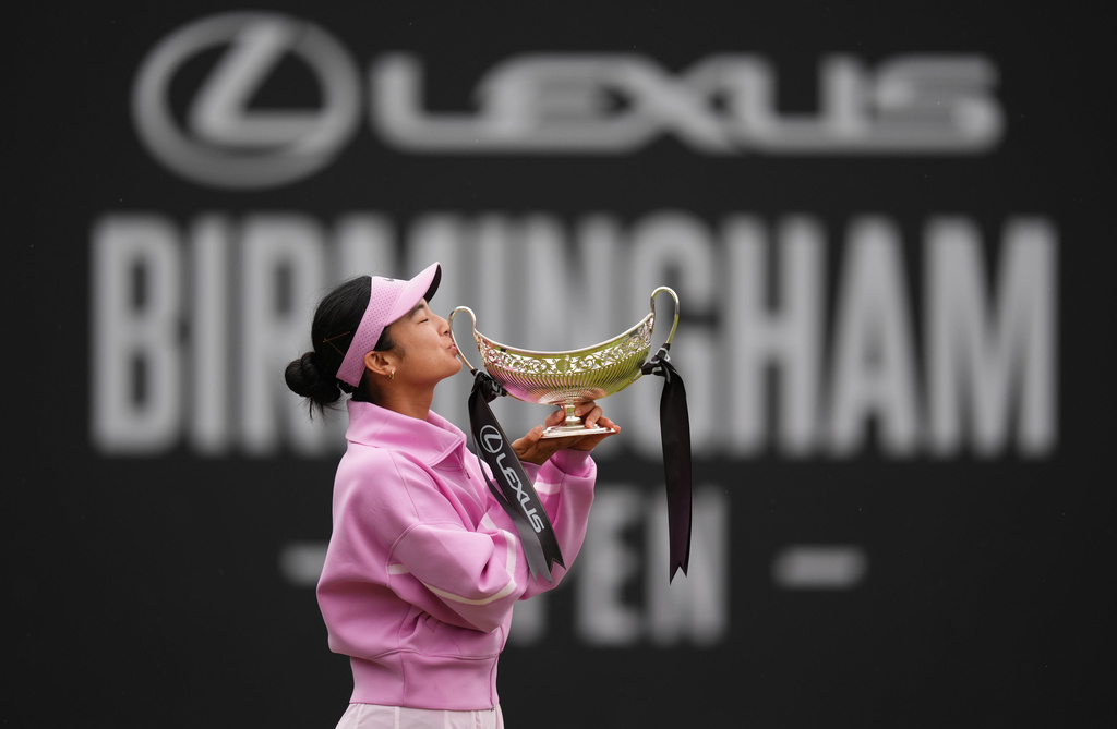 Philippines' Alexandra Eala celebrates winning her women's singles final match against Nikola Bartunkova on day nine of the Lexus Birmingham Open Championships at Edgbaston Priory Club, Birmingham, England, Sunday June 7, 2026. (Mike Egerton/PA via AP)