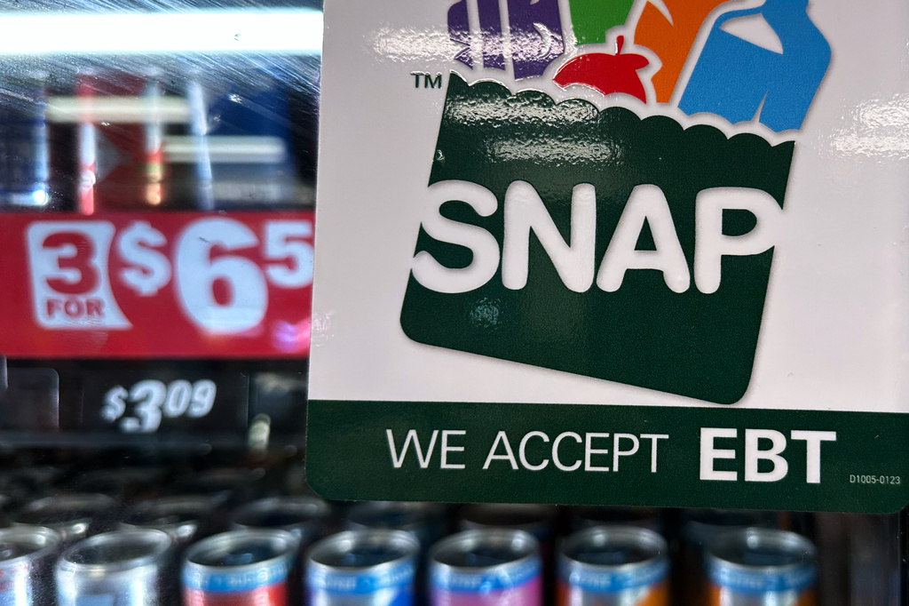 FILE - A SNAP EBT information sign is displayed at a gas station in Riverwoods, Ill., Nov. 1, 2025. (AP Photo/Nam Y. Huh, File)