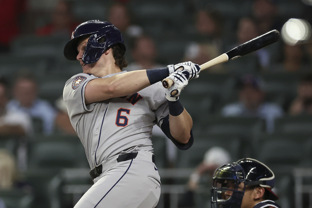 Houston Astros' Jake Meyers hits an RBI single in the fourth inning of a baseball game against the Atlanta Braves, Friday, Sept. 12, 2025, in Atlanta. (AP Photo/Colin Hubbard)