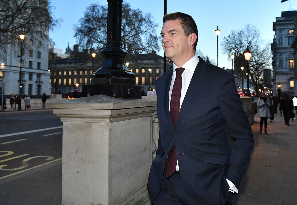 FILE - Olly Robbins walks on Whitehall in Westminster, London, Jan. 17, 2019. (Dominic Lipinski/PA via AP, File)