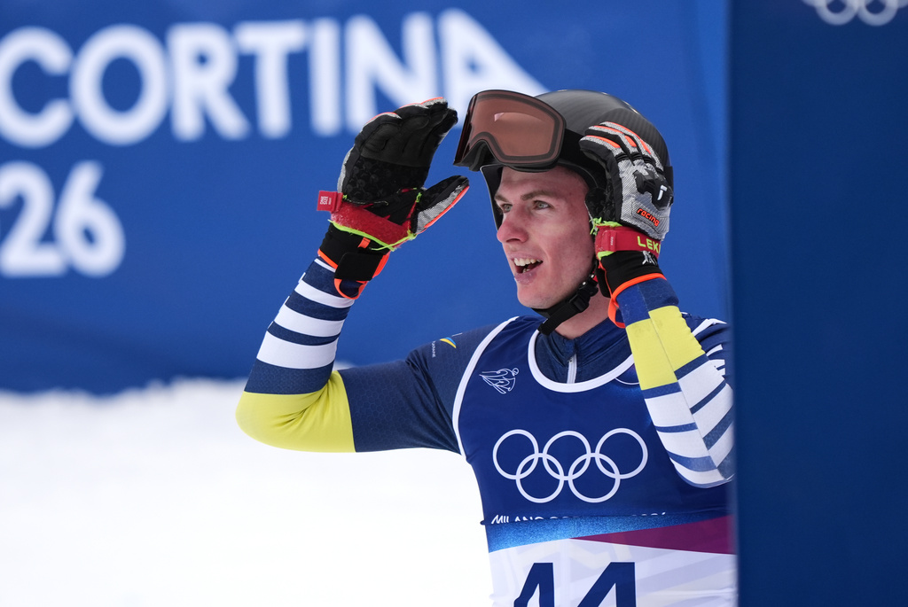 Ukraine's Dmytro Shepjuk at the finish area, during the alpine ski, men's downhill first official training, at the 2026 Winter Olympics, in Bormio, Italy, Wednesday, Feb. 4, 2026. (AP Photo/Pier Marco Tacca)