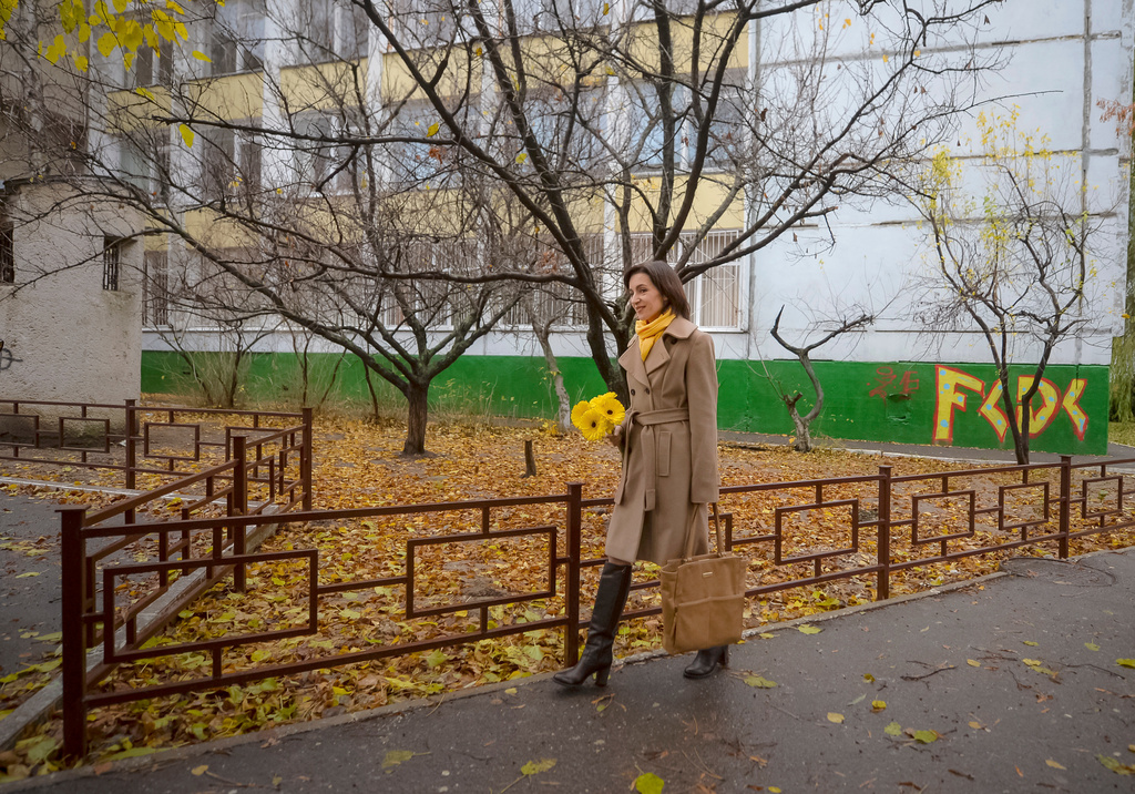 FILE - Pro-European presidential candidate Maia Sandu leaves a voting station in Chisinau, Moldova, Sunday, Nov. 13, 2016. (AP Photo/Andreea Alexandru)