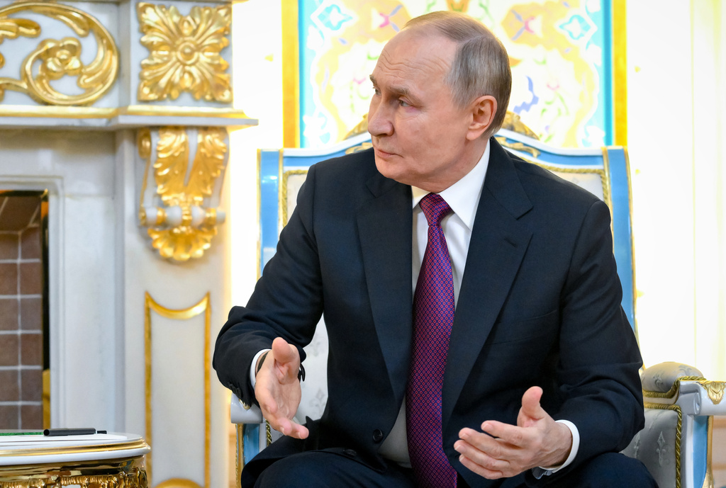Russian President Vladimir Putin talks with Azerbaijan's President Ilham Aliyev during their meeting on the sidelines of the Russia-Central Asia summit in Dushanbe, Tajikistan, on Thursday, Oct. 9, 2025. (Grigory Sysoyev, Sputnik, Kremlin Pool Photo via AP)