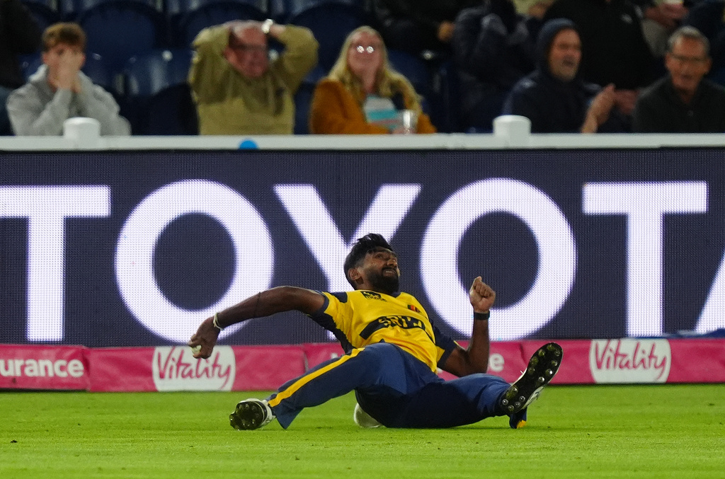 Sri Lanka's Eshan Malinga celebrates taking catch of England's Harry Brook during the second IT20 match between England and Sri Lanka in Cardiff, Wales, Thursday Sept. 17, 2026. (David Davies/PA via AP)