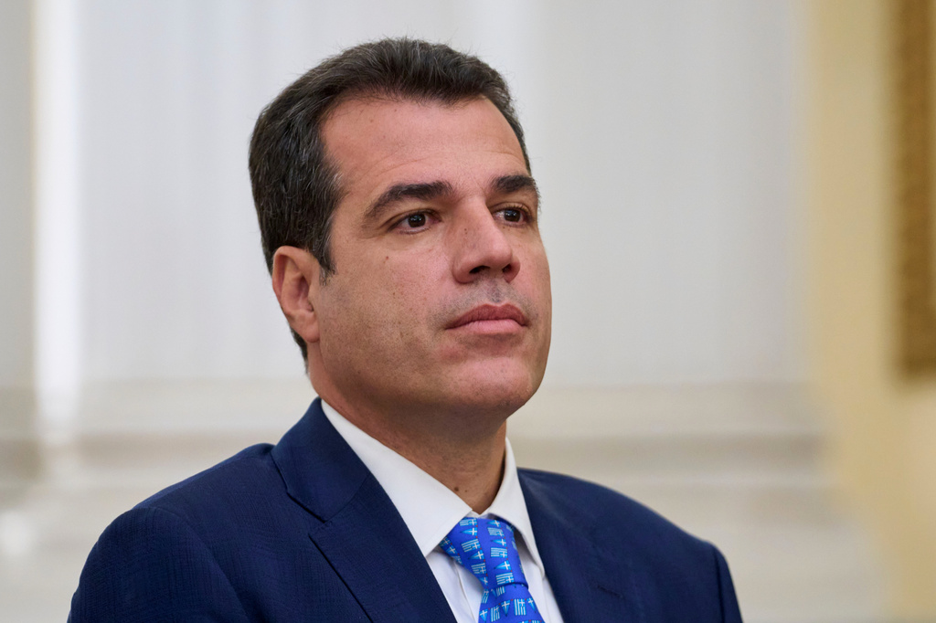 FILE - Greece's Migration Minister Thanos Plevris attends a swearing in ceremony at the Presidential palace, in Athens, on Monday, June 30, 2025. (AP Photo/Petros Giannakouris, File)