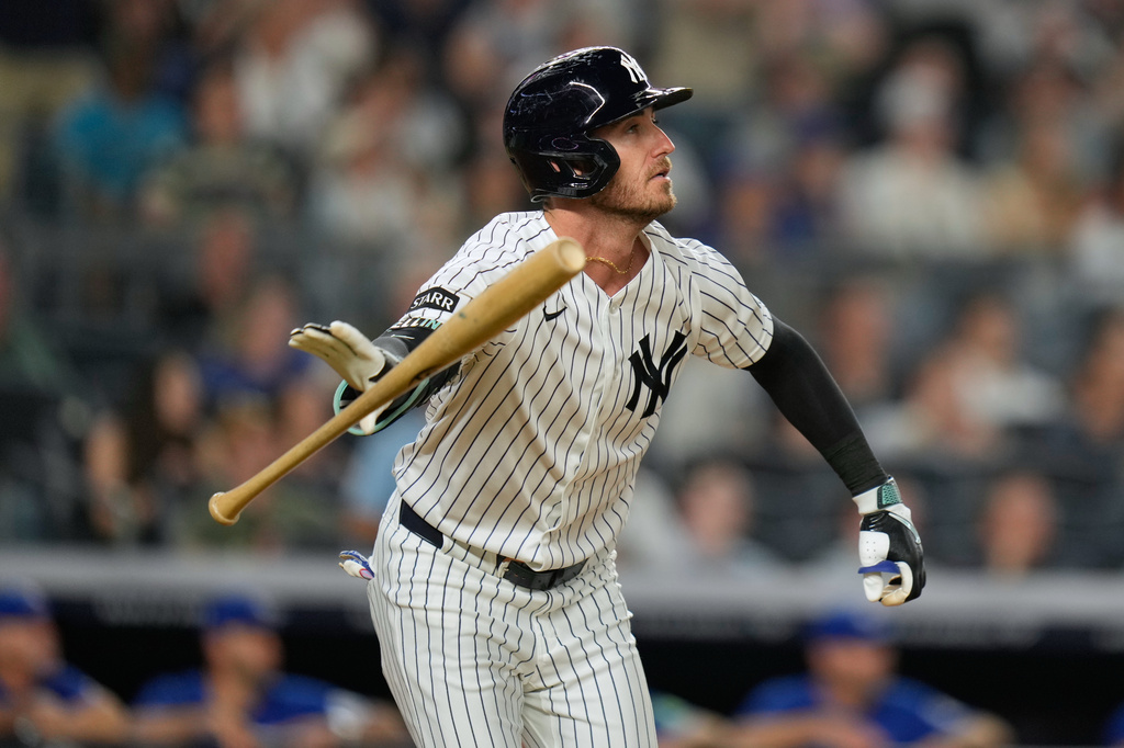 New York Yankees' Cody Bellinger looks after his two-run homer during the seventh inning of a baseball game against the Toronto Blue Jays, Monday, May 18, 2026, in New York. (AP Photo/Seth Wenig)