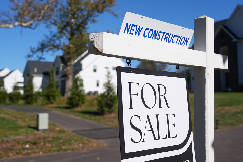 FILE - A sign is posted for a new home for sale in Ambler, Pa., Oct. 16, 2025. (AP Photo/Matt Rourke, File)