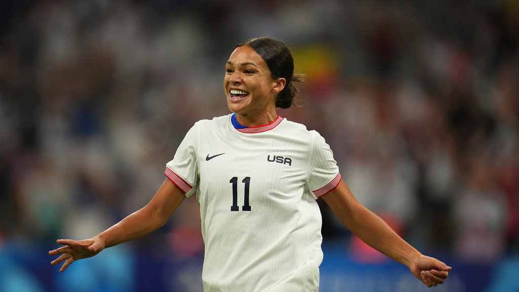 FILE - United States' Sophia Smith celebrates after scoring her side's first goal, during the women's Group B soccer match between the United States and Germany at the Velodrome stadium, during the 2024 Summer Olympics, in Marseille, France, July 28, 2024. (AP Photo/Daniel Cole, File)