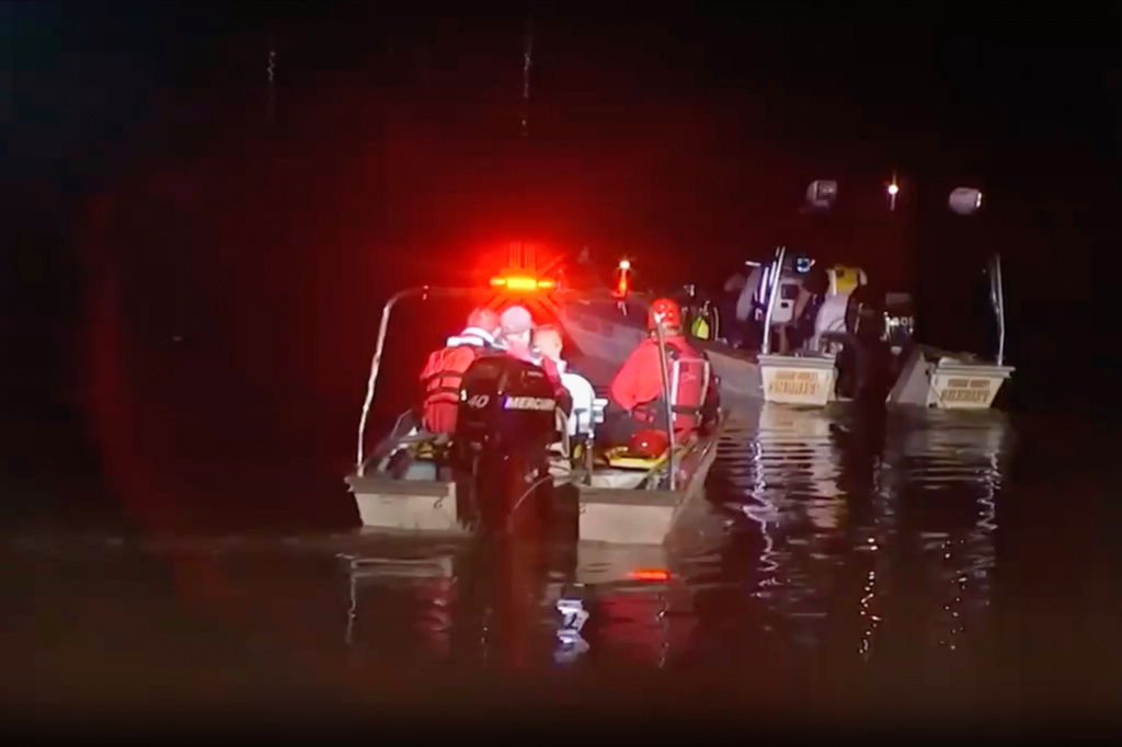 In this image taken from WABC-TV video, first responders search for missing children in the Passaic River, Wednesday, July 29, 2026, near Passaic, N.J. (WABC-TV via AP)