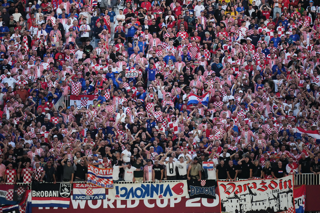 Fans of Croatia celebrate at the end of the World Cup Group L soccer match between Panama and Croatia in Toronto, Tuesday, June 23, 2026. (AP Photo/Stephanie Scarbrough)