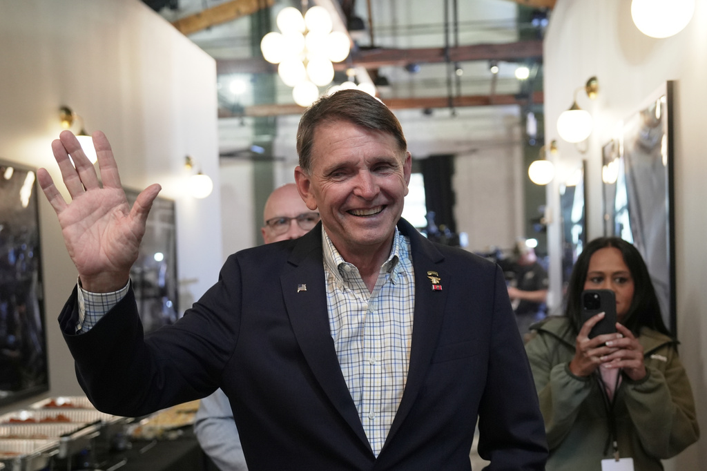 Republican congressional candidate Ed Gallrein greets supporters during an election night event Tuesday, May 19, 2026, in Covington, Ky. (AP Photo/Joshua A. Bickel)