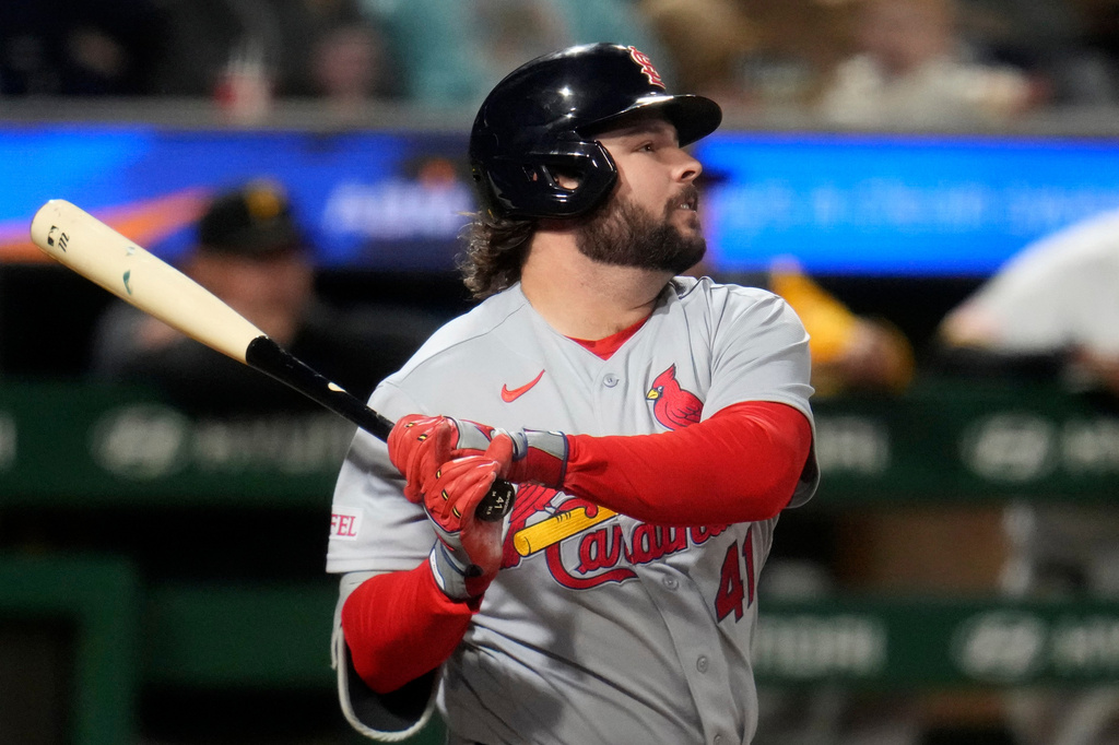 St. Louis Cardinals' Alec Burleson follows through on a single off Pittsburgh Pirates pitcher Brandon Eisert, driving in a run, during the third inning of a baseball game in Pittsburgh, Wednesday, Sept. 23, 2026. (AP Photo/Gene J. Puskar)
