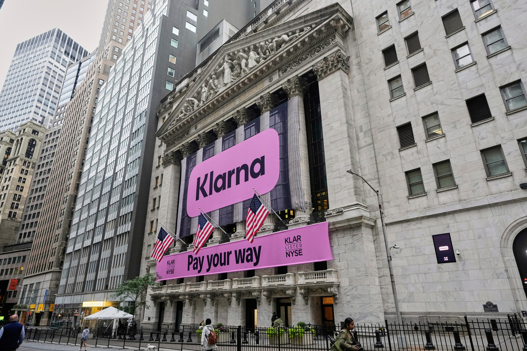 FILE - The facade of New York Stock Exchange displays signage for Sweden's Klarna, Sept. 10, 2025. (AP Photo/Richard Drew, File)