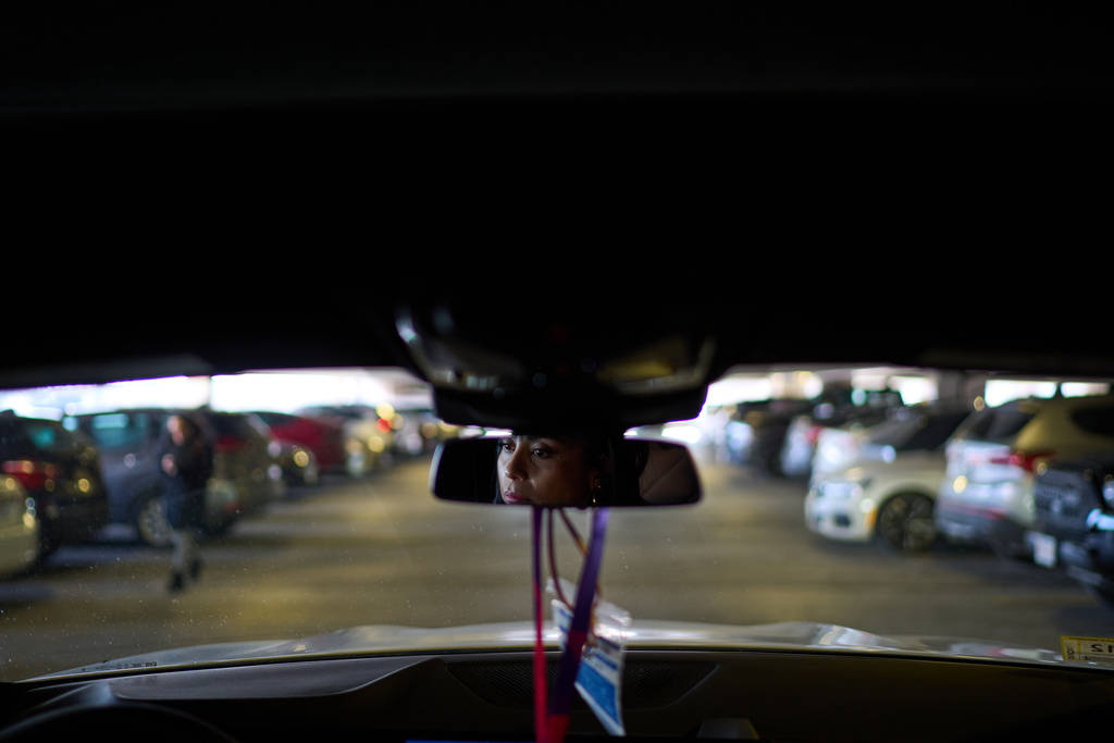 Ruth Wilson looks for a parking spot as she arrives for her monthly lupus-focused IV treatment at UMass Memorial Medical Center, Tuesday, Jan. 14, 2025, in Worcester, Mass. (AP Photo/David Goldman)