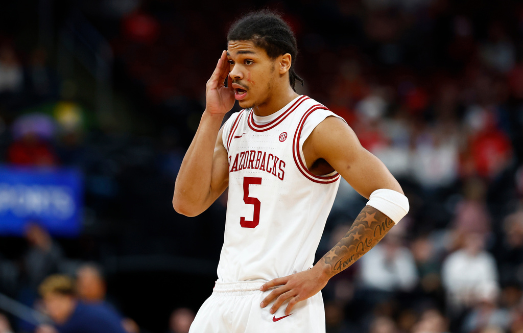 Arkansas guard Darius Acuff Jr. looks on during the second half of an NCAA college basketball game against Houston, Saturday, Dec. 20, 2025, in Newark, N.J. (AP Photo/Noah K. Murray)